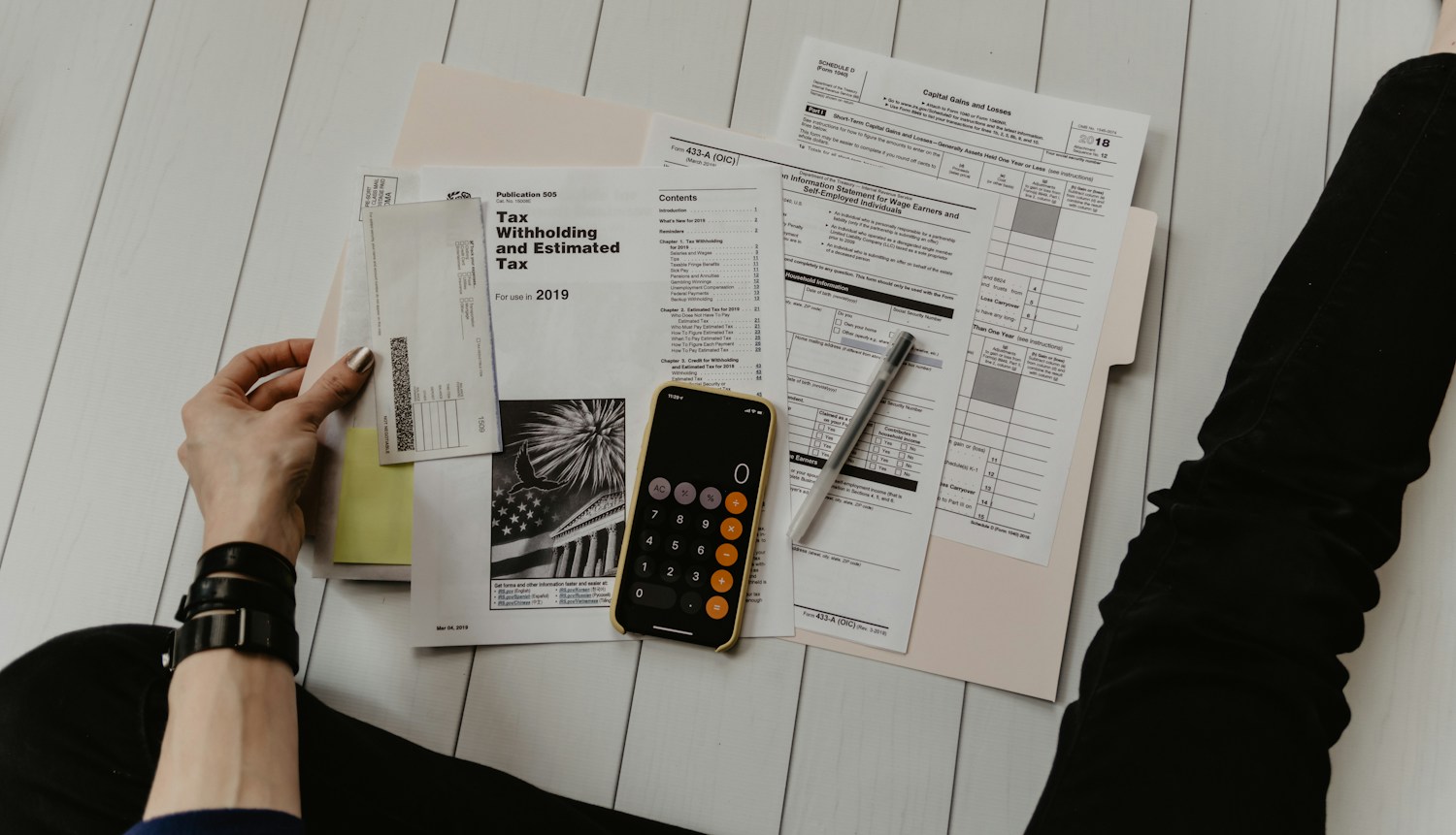 Paperwork and a calculator on a desk